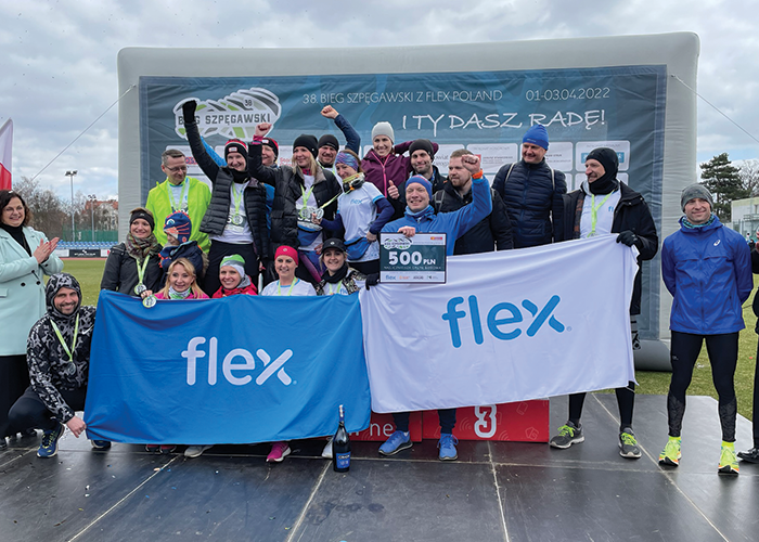 Gruppe von Flex Polen-Mitarbeitern